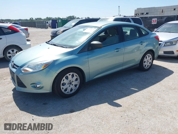 2012 Ford Focus SE z VIN 1FAHP3F22CL352952, wystawiony jako IAAI lot #42722671 z przebiegiem 126 923 mil mil oraz . Historia ofert i sprzedaży dostępna na DreamBid. Obrazek 2.