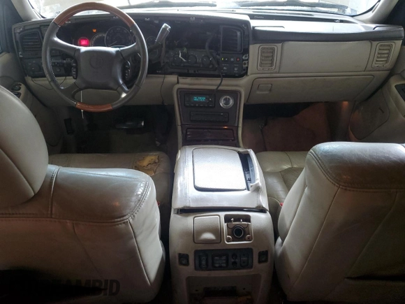 2002 Cadillac Escalade z VIN 1GYEC63T22R234266, wystawiony jako Copart lot #53041985 z przebiegiem 186 571 mil mil oraz Szkody całkowita. Historia ofert i sprzedaży dostępna na DreamBid. Obrazek 8.