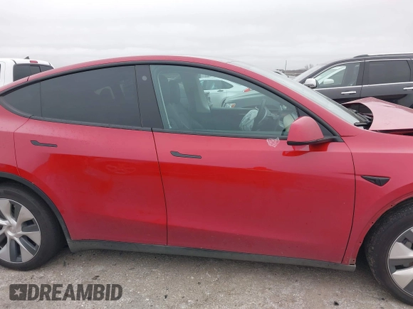 2023 Tesla Model Y Long Range with VIN 7SAYGDEE6PA027497, listed as a IAAI auction lot 41491072 with 24,962 mi miles and . Bid and sale history available at DreamBid. Image 13.