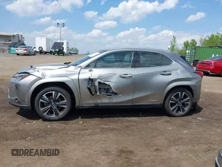 2022 Lexus UX 250h z VIN JTHP9JBHXN2054896, wystawiony jako IAAI lot #42152570 z przebiegiem 35 546 mil mil oraz . Historia ofert i sprzedaży dostępna na DreamBid. Obrazek 14.