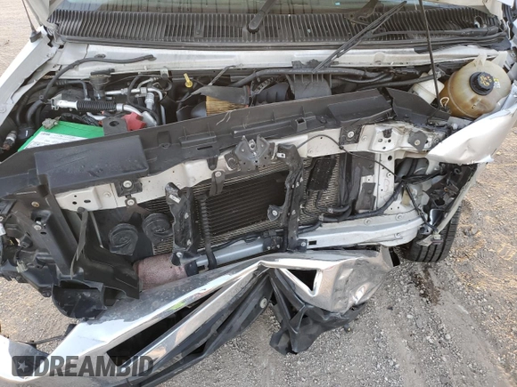 2009 Ford Econoline Passenger XL with VIN 1FMNE11L29DA55878, listed as a Copart auction lot 74945294 with 75,086 mi miles and Salvage title. Bid and sale history available at DreamBid. Image 12.