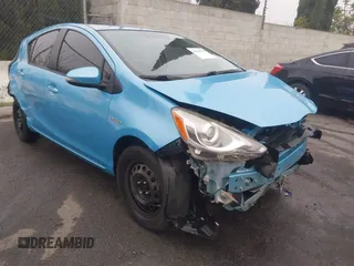 2015 Toyota Prius One with VIN JTDKDTB3XF1112555, listed as a IAAI auction lot 41655384 with 165,551 mi miles and . Bid and sale history available at carsss.com. Image 1.
