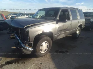 1999 Chevrolet Tahoe Z71 with VIN 1GNEK13R7XJ528100, listed as a IAAI auction lot 28872658 with 158,958 mi miles and . Bid and sale history available at DreamBid. Image 2.