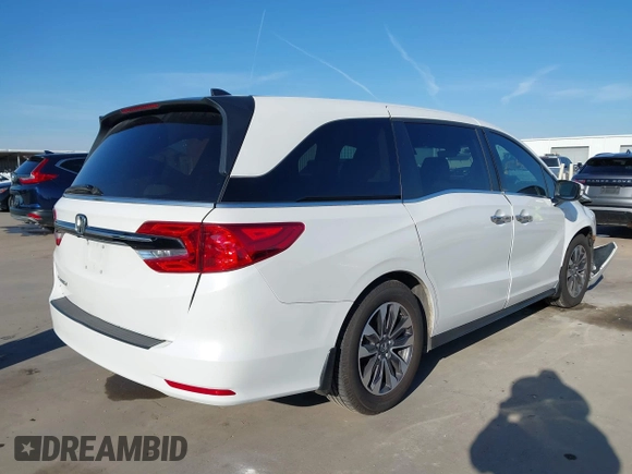 2023 Honda Odyssey EX-L with VIN 5FNRL6H66PB029475, listed as a IAAI auction lot 41128411 with 49,662 mi miles. Bid and sale history available at carsss.com. Image 4.