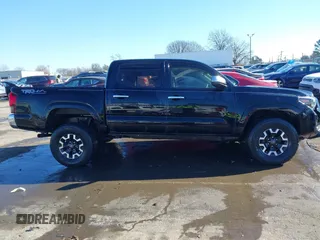 2018 Toyota Tacoma SR with VIN 5TFCZ5ANXJX124991, listed as a IAAI auction lot 41136867 with 57,980 mi miles and . Bid and sale history available at carsss.com. Image 13.