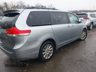 2013 Toyota Sienna XLE with VIN 5TDDK3DC5DS070243, listed as a IAAI auction lot 41162661 with 149,672 mi miles and . Bid and sale history available at DreamBid. Image 4.