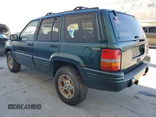 1998 Jeep Grand Cherokee Limited with VIN 1J4GZ78Y1WC124156, listed as a Copart auction lot 77587394 with 176,936 mi miles and Clean Title. Bid and sale history available at carsss.com. Image 2.