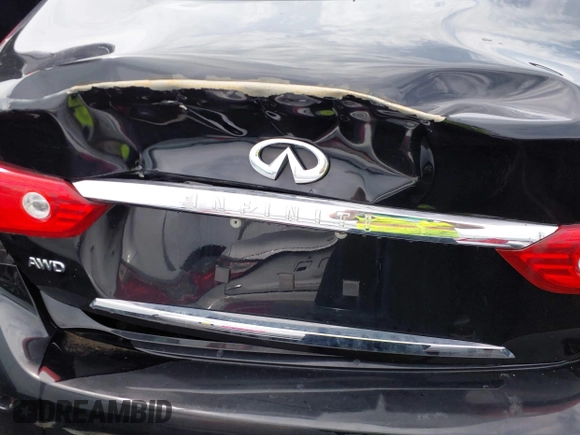 2015 Infiniti Q50 z VIN JN1BV7AR6FM412573, wystawiony jako IAAI lot #41796802 z przebiegiem 136 410 mil mil oraz . Historia ofert i sprzedaży dostępna na DreamBid. Obrazek 19.