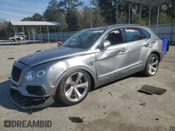 2019 Bentley Bentayga V8 z VIN SJAAM2ZV9KC024755, wystawiony jako Copart lot #46757605 z przebiegiem 26 951 mil mil oraz Szkoda całkowita • Salvage title. Historia ofert i sprzedaży dostępna na DreamBid. Obrazek 1.
