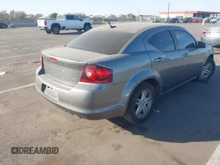 2012 Dodge Avenger SXT z VIN 1C3CDZCB6CN223500, wystawiony jako IAAI lot #41262587 z przebiegiem 166 085 mil mil oraz . Historia ofert i sprzedaży dostępna na DreamBid. Obrazek 4.