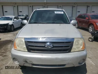 2004 Suzuki XL7 LX z VIN JS3TX92V644109794, wystawiony jako Copart lot #68244184 z przebiegiem 107 769 mil mil oraz Szkoda całkowita • Salvage title. Historia ofert i sprzedaży dostępna na DreamBid. Obrazek 5.