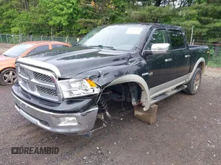 2009 Dodge 1500 Laramie z VIN 1D3HV13T69S799484, wystawiony jako IAAI lot #42312702 z przebiegiem 254 233 mil mil oraz . Historia ofert i sprzedaży dostępna na DreamBid. Obrazek 2.
