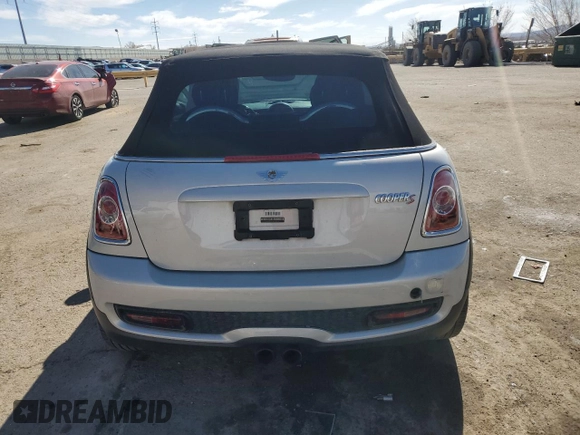 2012 MINI Convertible S z VIN WMWZP3C58CT550106, wystawiony jako Copart lot #45629035 z przebiegiem 104 851 mil mil oraz Szkoda całkowita • Salvage title. Historia ofert i sprzedaży dostępna na DreamBid. Obrazek 6.