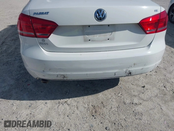 2013 Volkswagen Passat SE w/Sunroof with VIN 1VWBH7A30DC042088, listed as a IAAI auction lot 41990809 with 126,590 mi miles. Bid and sale history available at carsss.com. Image 6.