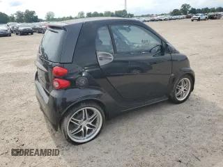 2009 Smart fortwo Pure z VIN WMEEJ31XX9K269982, wystawiony jako Copart lot #59214215 z przebiegiem 99 711 mil mil oraz Tytuł czysty. Historia ofert i sprzedaży dostępna na DreamBid. Obrazek 3.