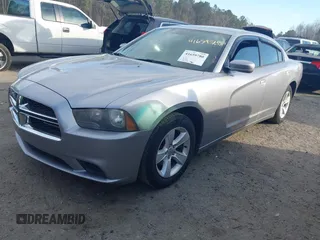 2014 Dodge Charger SE with VIN 2C3CDXBG5EH251804, listed as a IAAI auction lot 41659780 with 207,956 mi miles. Bid and sale history available at carsss.com. Image 2.
