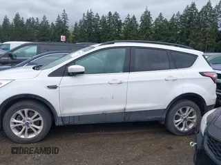 2018 Ford Escape SEL with VIN 1FMCU9HD5JUA42764, listed as a IAAI auction lot 41869026 with 84,958 mi miles. Bid and sale history available at carsss.com. Image 14.