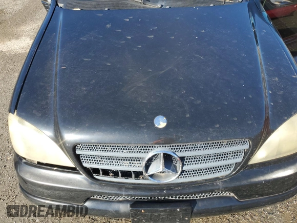 2001 Mercedes-Benz M 320/430/500 with VIN 4JGAB72EX1A277472, listed as a Copart auction lot 86857214 with Not provided miles and Salvage title. Bid and sale history available at DreamBid. Image 12.