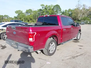 2015 Ford F-150 XLT with VIN 1FTEW1C87FKD70547, listed as a IAAI auction lot 41451841 with 151,596 mi miles and . Bid and sale history available at carsss.com. Image 4.