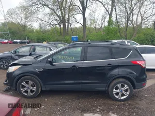 2013 Ford Escape SE with VIN 1FMCU0GX6DUC98598, listed as a IAAI auction lot 42133641 with 174,111 mi miles and . Bid and sale history available at DreamBid. Image 14.