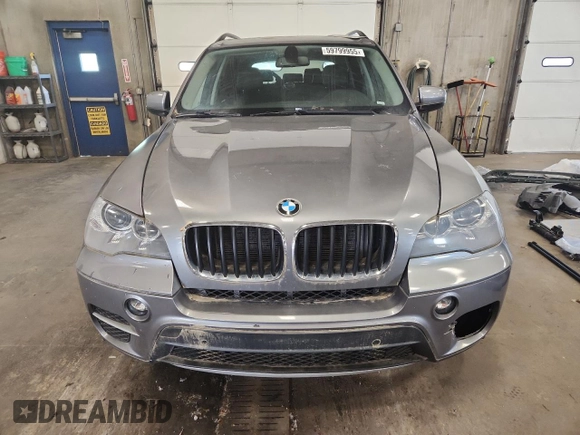 2012 BMW X5 35i z VIN 5UXZV4C58CL758466, wystawiony jako Copart lot #59799955 z przebiegiem 119 331 mil mil oraz Nie do naprawy • Non repairable. Historia ofert i sprzedaży dostępna na DreamBid. Obrazek 5.