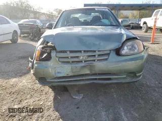 2004 Hyundai Accent GL with VIN KMHCG45C44U531828, listed as a Copart auction lot 86428134 with 92,054 mi miles and Salvage Title. Bid and sale history available at carsss.com. Image 5.
