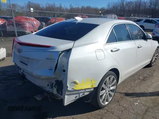2016 Cadillac ATS Sedan Luxury Collection AWD with VIN 1G6AH5SX5G0106431, listed as a IAAI auction lot 41844622 with 124,759 mi miles. Bid and sale history available at carsss.com. Image 4.