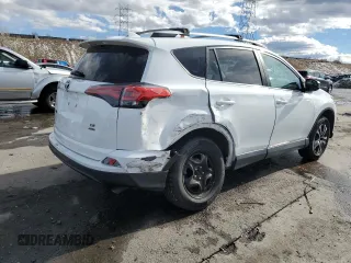 2018 Toyota RAV4 LE with VIN 2T3BFREVXJW741009, listed as a Copart auction lot 46268685 with 53,467 mi miles and Salvage Title. Bid and sale history available at DreamBid. Image 3.