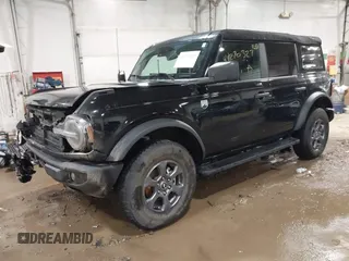 2023 Ford Bronco with VIN 1FMEE5BP1PLB34406, listed as a IAAI auction lot 41270327 with 25,536 mi miles. Bid and sale history available at carsss.com. Image 2.