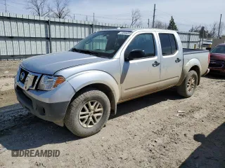 2015 Nissan Frontier Pro-4X with VIN 1N6AD0EV1FN701118, listed as a Copart auction lot 53055055 with 225,081 mi miles and Salvage title. Bid and sale history available at DreamBid. Image 1.