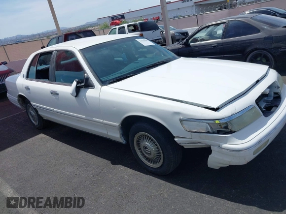1996 Mercury Grand Marquis GS with VIN 2MELM74WXTX650841, listed as a IAAI auction lot 41936608 with 205,964 mi miles and . Bid and sale history available at DreamBid. Image 13.