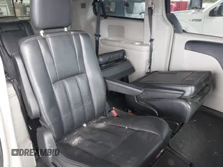 2014 Chrysler Town & Country Touring with VIN 2C4RC1BG8ER296073, listed as a IAAI auction lot 42164103 with 129,006 mi miles and . Bid and sale history available at DreamBid. Image 8.