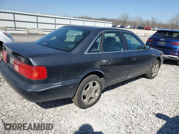 1997 Audi A6 z VIN WAUGA84A4VN006453, wystawiony jako Copart lot #47408094 z przebiegiem 333 651 mil mil oraz Szkoda całkowita • Salvage title. Historia ofert i sprzedaży dostępna na DreamBid. Obrazek 3.