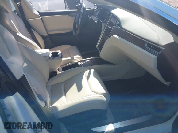 2017 Tesla Model S 100D with VIN 5YJSA1E22HF219352, listed as a IAAI auction lot 41831322 with 97,516 mi miles and . Bid and sale history available at DreamBid. Image 5.