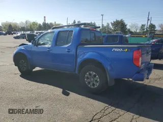 2015 Nissan Frontier Pro-4X with VIN 1N6AD0EV2FN736394, listed as a Copart auction lot 53916455 with 116,801 mi miles and Salvage title. Bid and sale history available at DreamBid. Image 2.