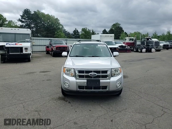 2012 Ford Escape Limited z VIN 1FMCU9EG1CKB16341, wystawiony jako Copart lot #57063845 z przebiegiem 128 205 mil mil oraz Szkoda całkowita • Salvage title. Historia ofert i sprzedaży dostępna na DreamBid. Obrazek 14.