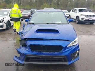 2021 Subaru WRX Premium z VIN JF1VA1C6XM9818786, wystawiony jako IAAI lot #42182203 z przebiegiem 52 535 mil mil oraz . Historia ofert i sprzedaży dostępna na DreamBid. Obrazek 13.