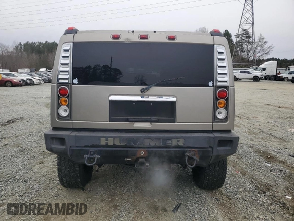 2004 Hummer H2 with VIN 5GRGN23U24H118230, listed as a Copart auction lot 87764075 with 202,206 mi miles and Salvage Title. Bid and sale history available at carsss.com. Image 6.