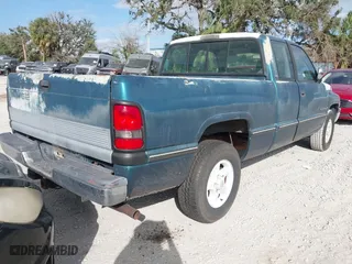 1996 Dodge Ram 1500 with VIN 3B7HC13Z3TG143986, listed as a IAAI auction lot 40826804 with 31,859 mi miles. Bid and sale history available at carsss.com. Image 4.