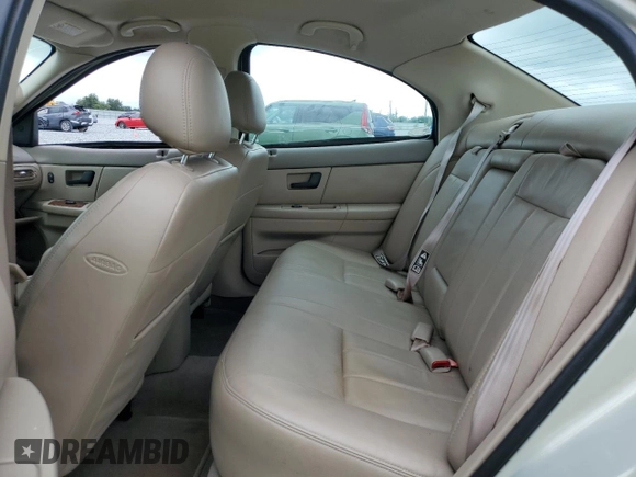 2003 Mercury Sable LS z VIN 1MEHM55S53A618975, wystawiony jako Copart lot #52073645 z przebiegiem 88 650 mil mil oraz Szkoda całkowita • Salvage title. Historia ofert i sprzedaży dostępna na DreamBid. Obrazek 10.
