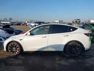 2021 Tesla Model Y Performance with VIN 5YJYGDEF2MF258711, listed as a IAAI auction lot 41367832 with 47,662 mi miles and . Bid and sale history available at DreamBid. Image 14.