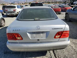 1998 Mercedes-Benz E 320 with VIN WDBJF25F9WA697018, listed as a Copart auction lot 87567315 with 107,255 mi miles and Clean Title. Bid and sale history available at DreamBid. Image 6.