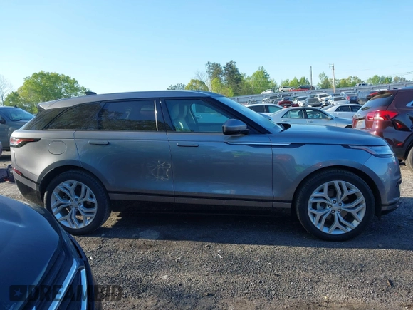 2020 Land Rover Range Rover Velar S z VIN SALYB2EXXLA295307, wystawiony jako IAAI lot #41971330 z przebiegiem 12 192 mil mil oraz . Historia ofert i sprzedaży dostępna na DreamBid. Obrazek 13.