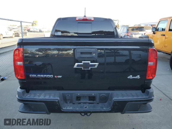 2019 Chevrolet Colorado 2WD Z71 with VIN 1GCGSDEN1K1314774, listed as a Copart auction lot 77212044 with 74,689 mi miles and Salvage Title. Bid and sale history available at carsss.com. Image 6.
