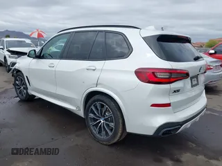 2020 BMW X5 sDrive40i with VIN 5UXCR4C04L9D41635, listed as a IAAI auction lot 42201174 with 64,989 mi miles and . Bid and sale history available at DreamBid. Image 3.