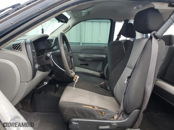 2009 Chevrolet Silverado 1500 Work Truck with VIN 1GCEK19C19Z285528, listed as a Copart auction lot 70892354 with 173,964 mi miles and Salvage Title. Bid and sale history available at carsss.com. Image 7.
