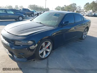 2018 Dodge Charger Daytona with VIN 2C3CDXCT2JH133294, listed as a IAAI auction lot 40938742 with 112,855 mi miles. Bid and sale history available at carsss.com. Image 2.