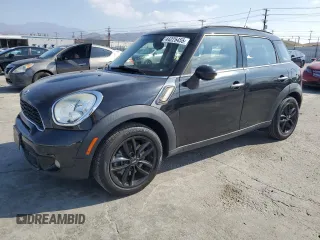 2014 MINI Countryman S with VIN WMWZC3C52EWT01281, listed as a Copart auction lot 44225455 with 57,463 mi miles and Salvage Title. Bid and sale history available at DreamBid. Image 1.