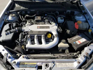 2004 Saturn L with VIN 1G8JD84R54Y500110, listed as a Copart auction lot 81977884 with 110,993 mi miles and Salvage Title. Bid and sale history available at carsss.com. Image 12.