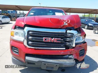 2016 GMC Canyon 2WD z VIN 1GTH5BEA8G1367539, wystawiony jako IAAI lot #41984288 z przebiegiem 111 878 mil mil oraz . Historia ofert i sprzedaży dostępna na DreamBid. Obrazek 6.